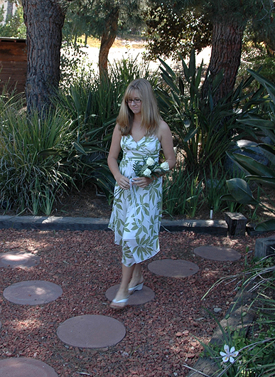 Larissa precedes the bride.