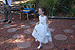 The flower girl leads the procession.